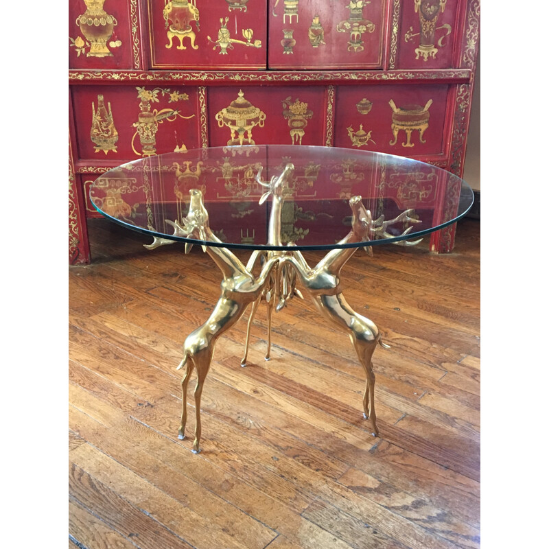 Circular coffee table with brass deer base - 1970s