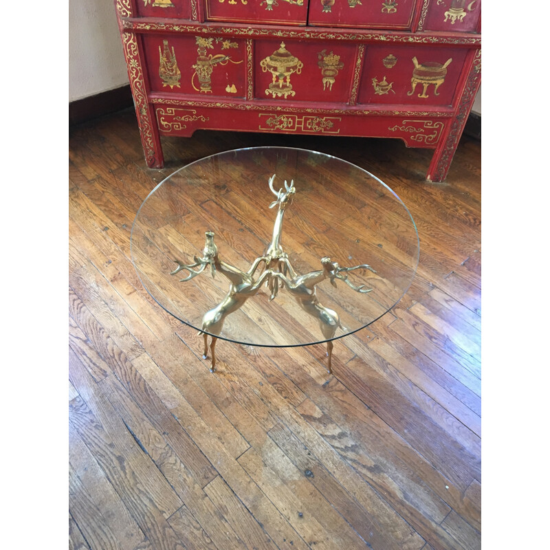 Circular coffee table with brass deer base - 1970s