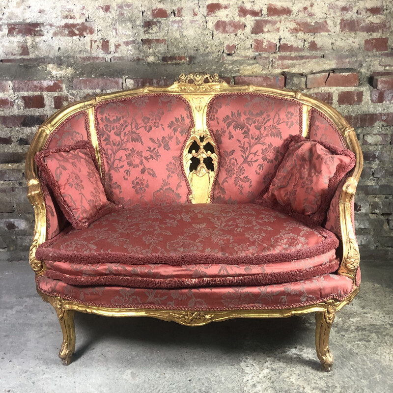 Canapé vintage en bois doré sculpté et tapissé