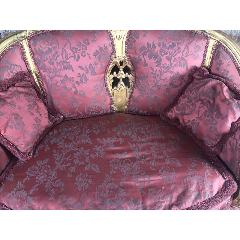 Carved and upholstered gilded wood vintage sofa