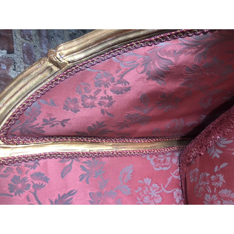 Carved and upholstered gilded wood vintage sofa