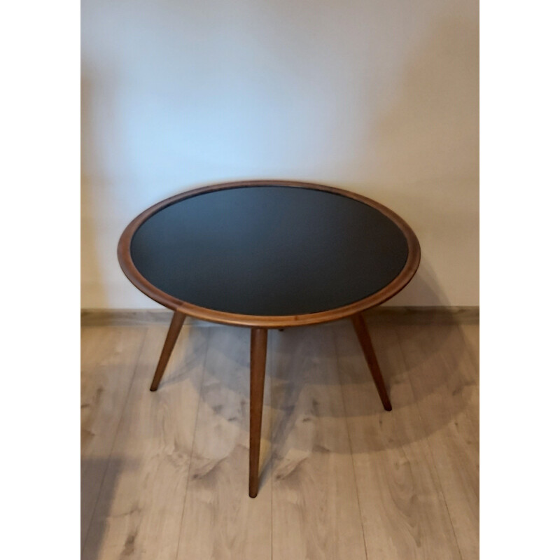 Vintage wood coffee table with black glass top, 1960