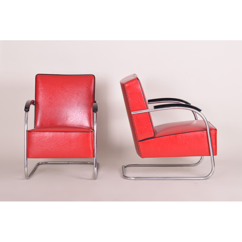 Vintage red armchair and footrest by Mucke Melder, 1930s