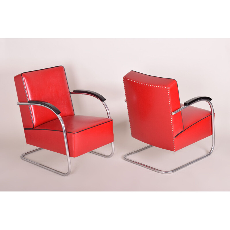 Vintage red armchair and footrest by Mucke Melder, 1930s