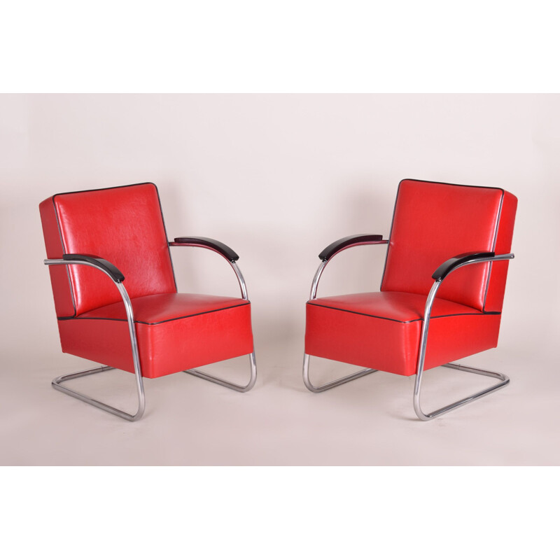 Vintage red armchair and footrest by Mucke Melder, 1930s