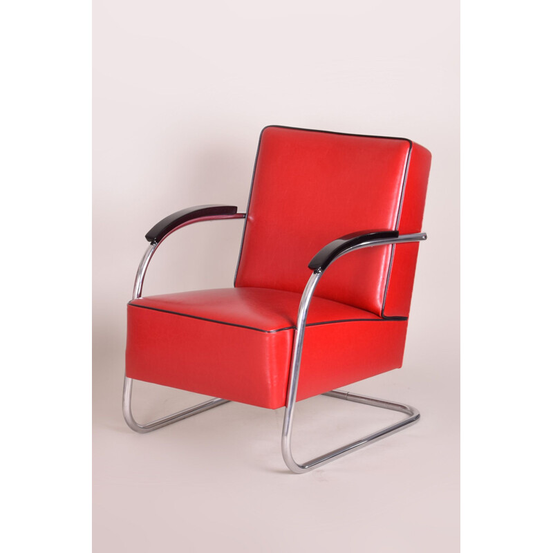 Vintage red leather armchair and footrest by Mucke Melder, 1930s