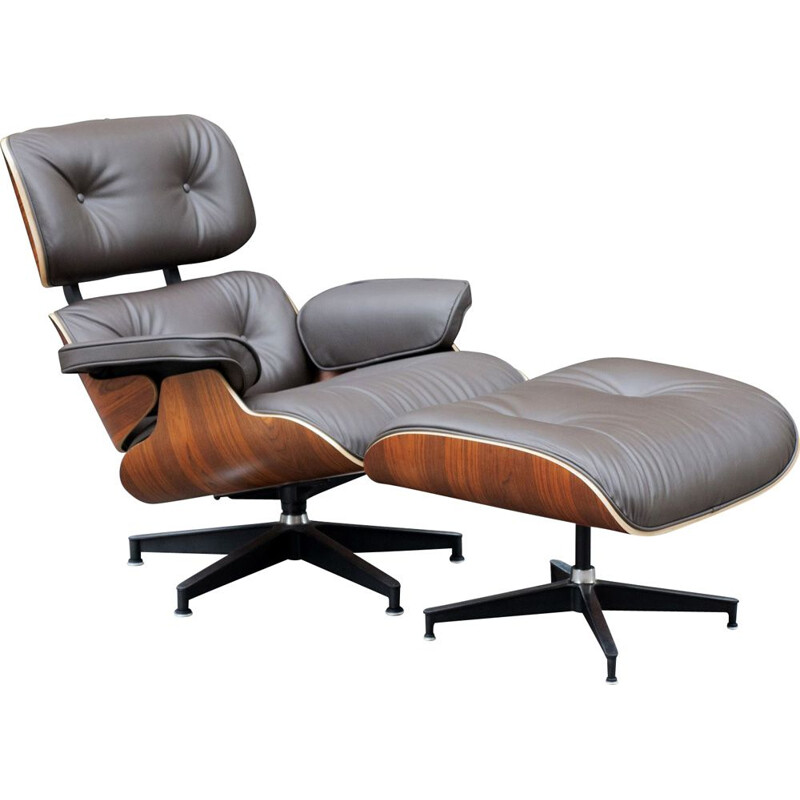 Vintage palissander stoel en voetenbank van Charles en Ray Eames voor Herman Miller.