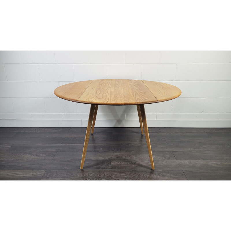 Vintage elmwood dining table by Ercol, 1960s