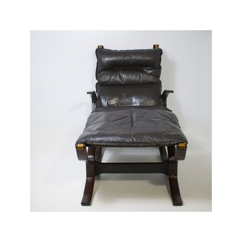 Vintage leather armchair with ottoman by Trygg Mobler, Denmark 1970