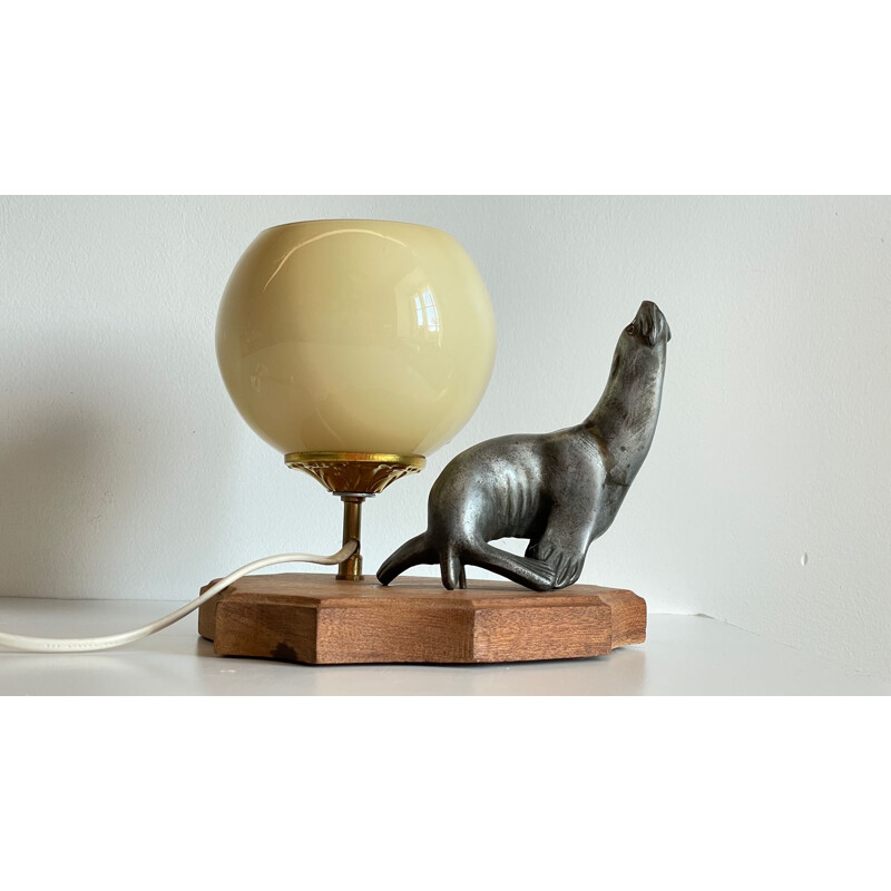 Vintage Art Deco metal and glass sea lion lamp, 1930