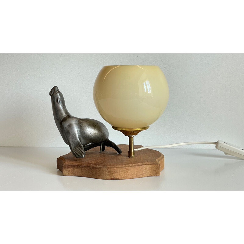 Vintage Art Deco metal and glass sea lion lamp, 1930