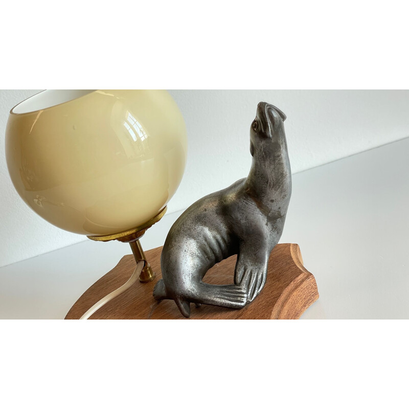 Vintage Art Deco metal and glass sea lion lamp, 1930