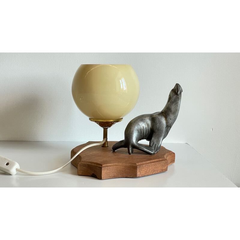 Vintage Art Deco metal and glass sea lion lamp, 1930