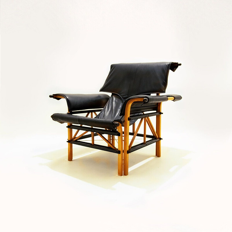 Vintage Italian black leather and wood armchair by Bernini