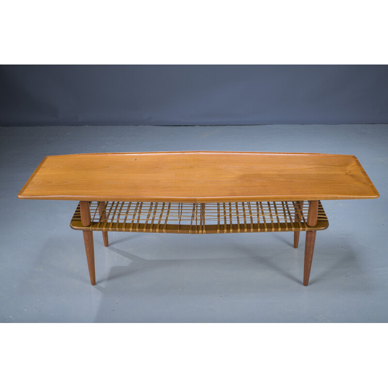 Mid-century coffee table in teak & rattan