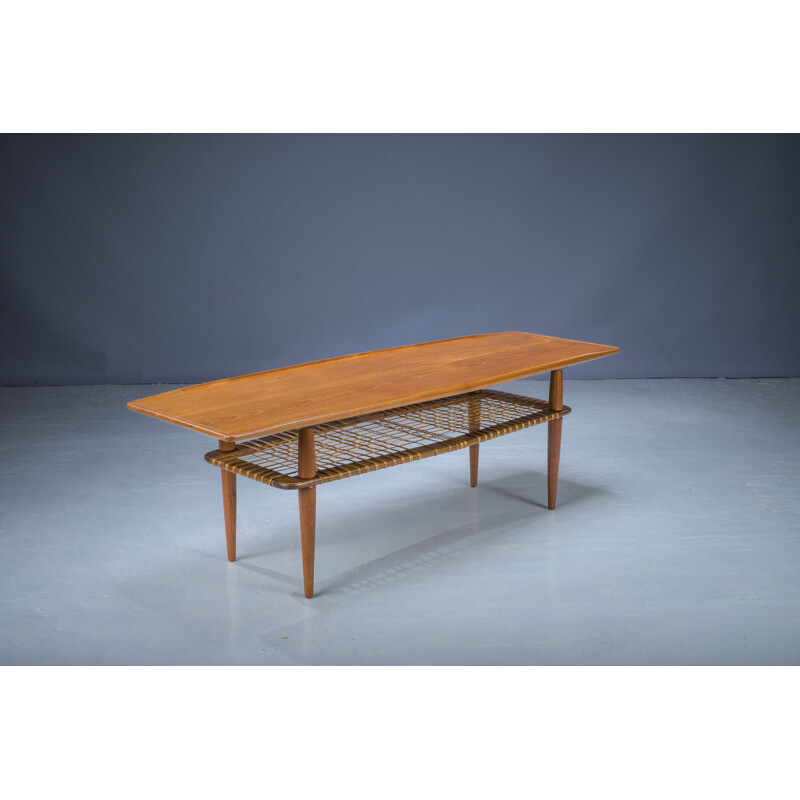 Mid-century coffee table in teak & rattan