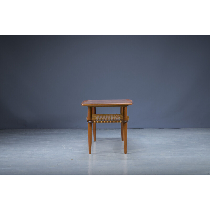 Mid-century coffee table in teak & rattan