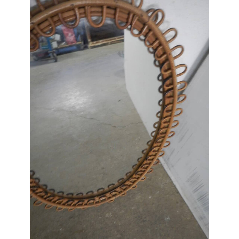 Vintage oval mirror in rattan