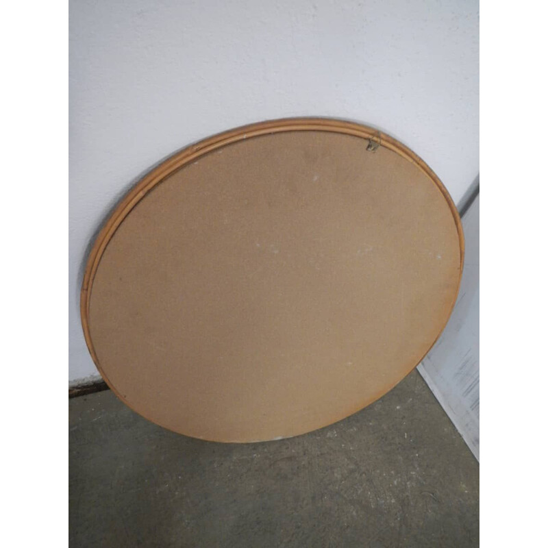 Round vintage wicker mirror