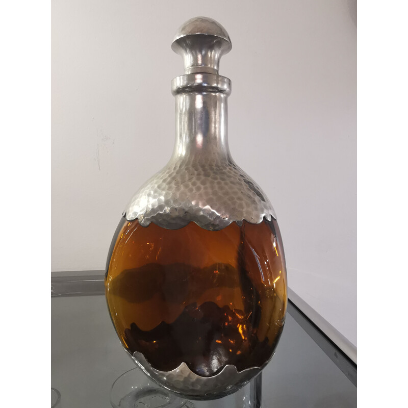Vintage decanter in glass and pewter