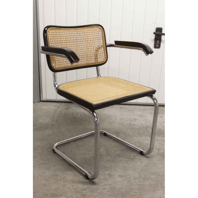 Vintage b64 armchair in black with honey-colored cane by Breuer