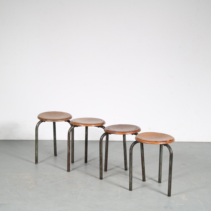 Set of 4 vintage tripod stools by Jean Prouvé for the Lycée Fabert in Metz, France 1950s