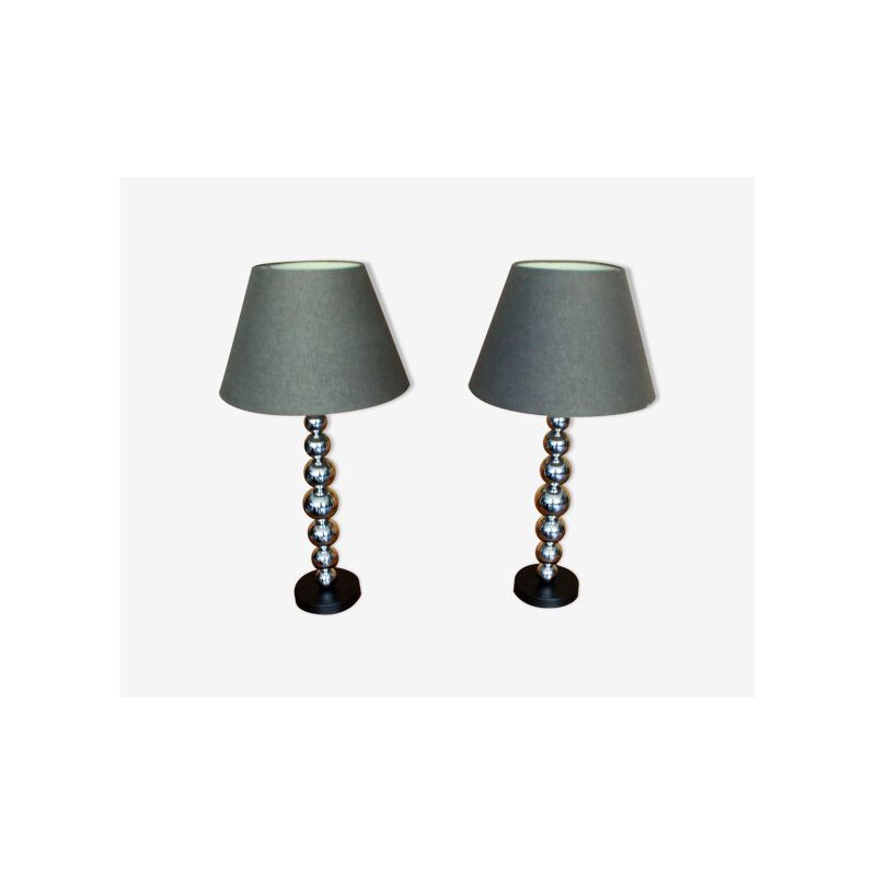 Pair of contemporary vintage lamps with chrome legs