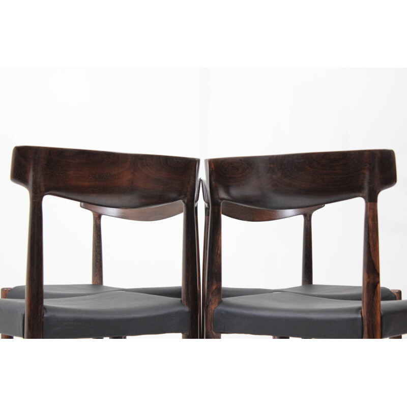 Set of 4 dining chairs in solid rosewood and black leather - 1960s