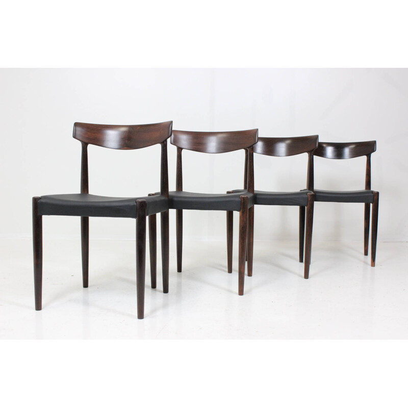 Set of 4 dining chairs in solid rosewood and black leather - 1960s