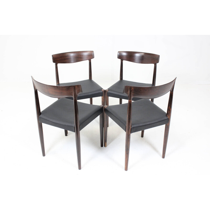 Set of 4 dining chairs in solid rosewood and black leather - 1960s