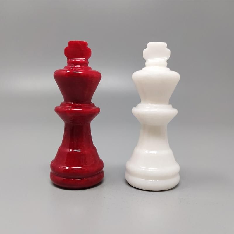 Vintage red and white chess set in alabaster from Volterra, Italy 1970