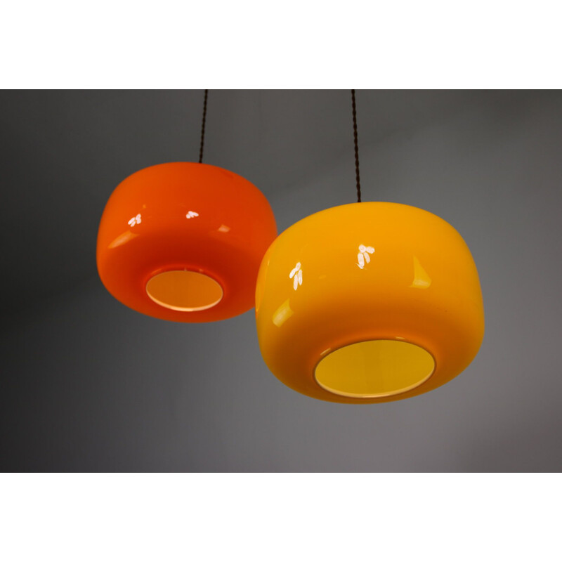 Pair of orange and yellow vintage glass pendant lamps