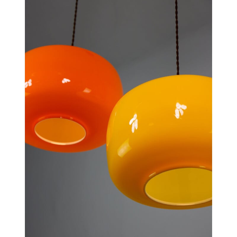 Pair of orange and yellow vintage glass pendant lamps