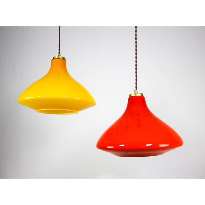Pair of mid century yellow and orange glass pendant lamps