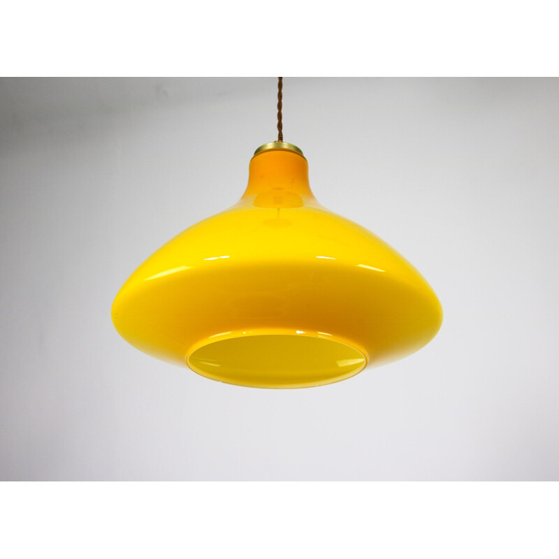 Pair of mid century yellow and orange glass pendant lamps