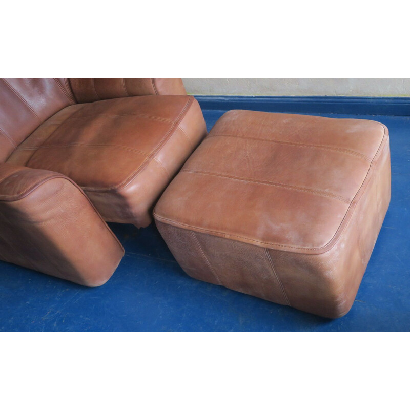Vintage buffalo leather model Ds44 armchair and ottoman by De Sede, Switzerland 1970s
