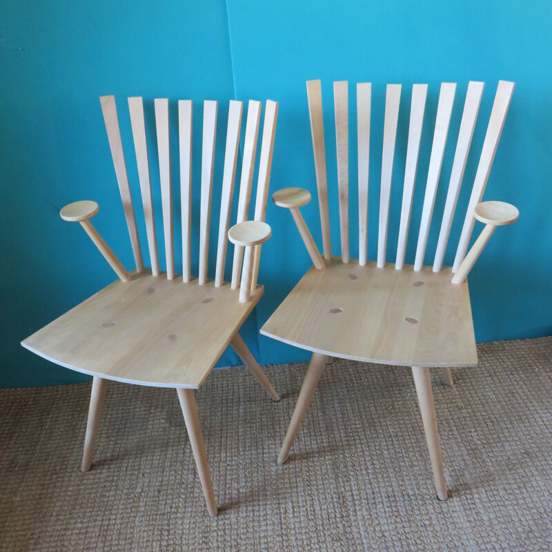 Pair of vintage armchairs with round tapered legs