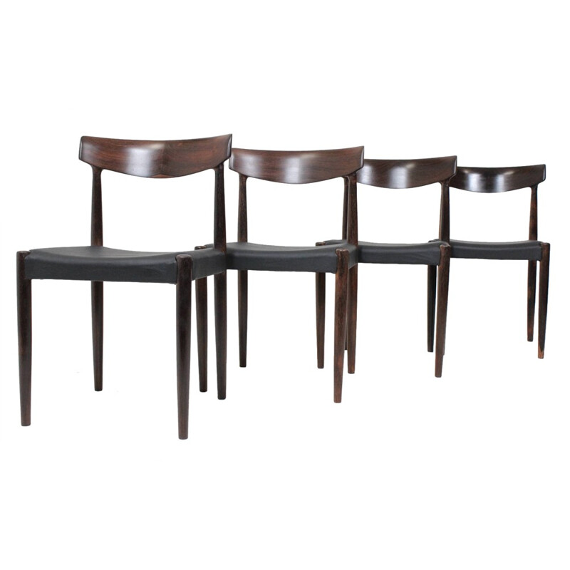 Set of 4 dining chairs in solid rosewood and black leather - 1960s