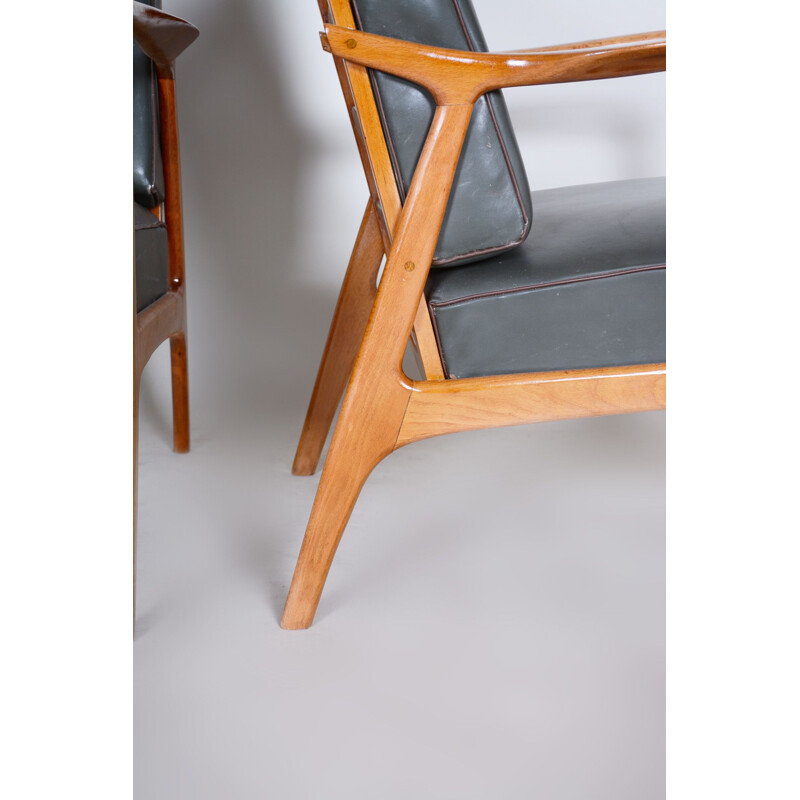 Pair of black mid century leather and oakwood armchairs, 1940s