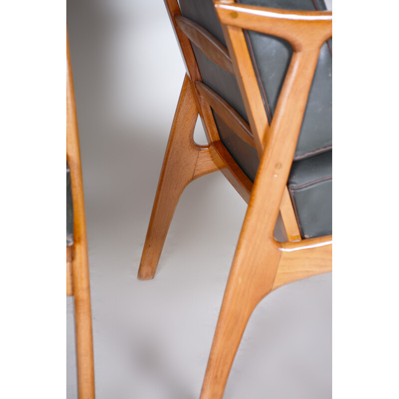 Pair of black mid century leather and oakwood armchairs, 1940s