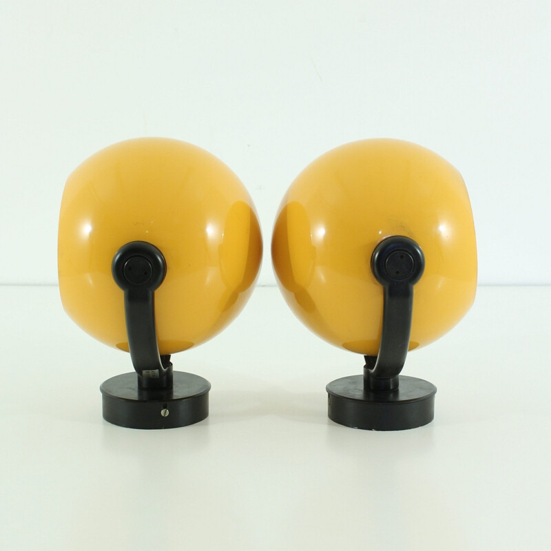 Pair of Erco wall lamps in yellow metal - 1970s