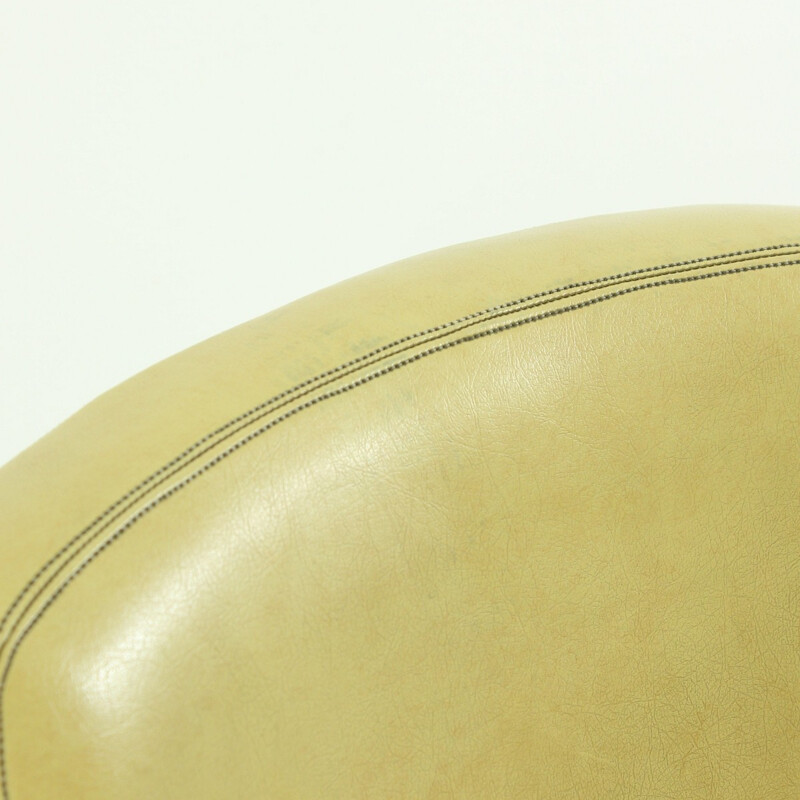 Mid-century armchair in yellow leatherette - 1950s