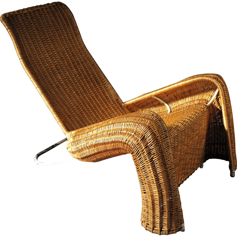 Vintage lounge chair in tubular metal and rattan - 1940s