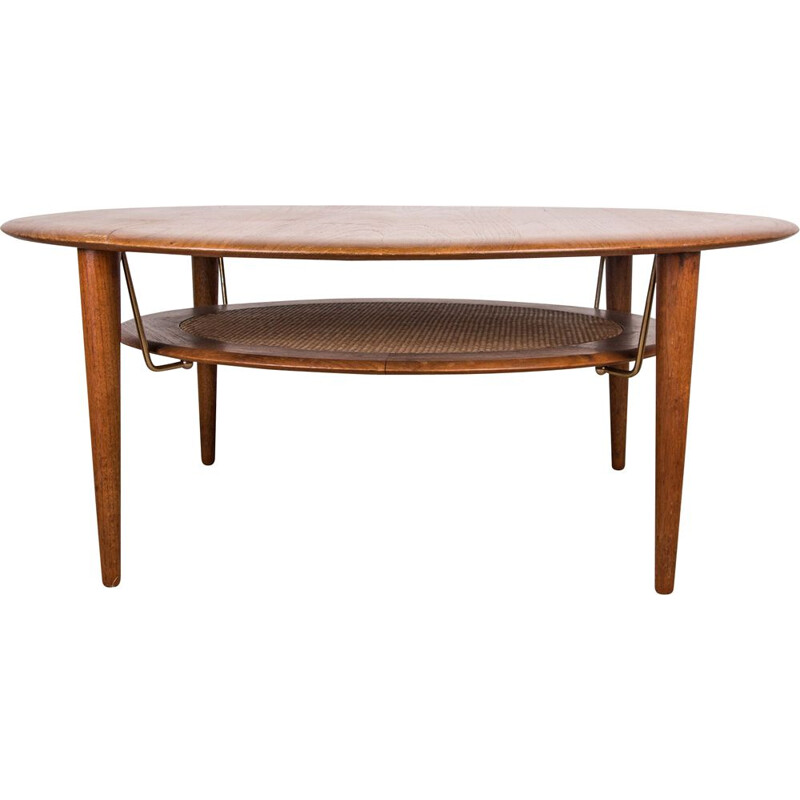 Vintage coffee table model FD 515 round in teak by Peter Hvidt, 1960s