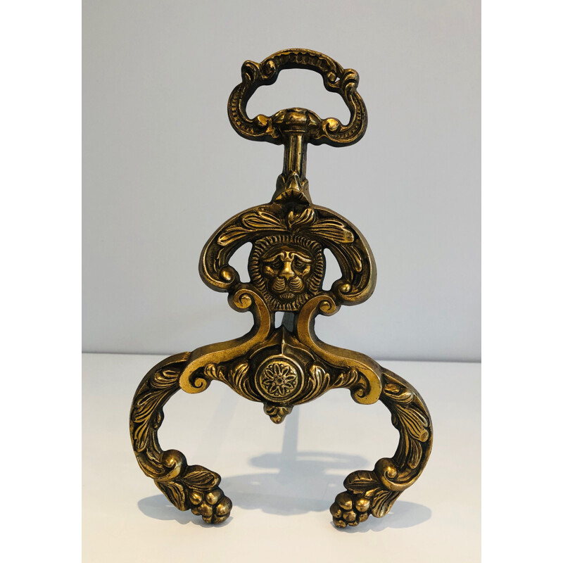 Coppia di candelabri d'epoca in bronzo e ferro battuto con teste di leone, 1940