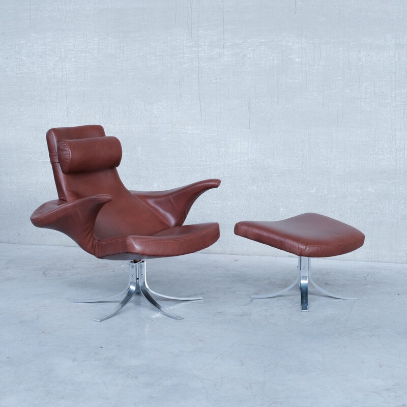 Danish leather mid-century armchair with ottoman by Gösta Berg for Fritz Hansen, 1960s