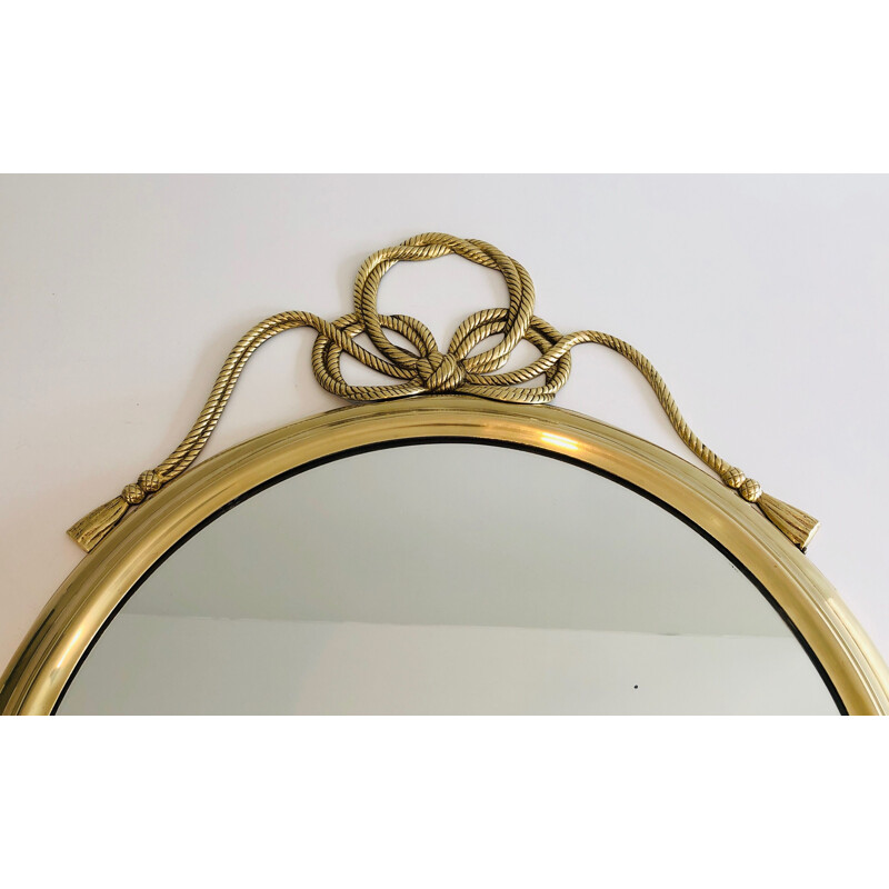 Vintage decorative oval brass mirror with twisted bow, France 1970