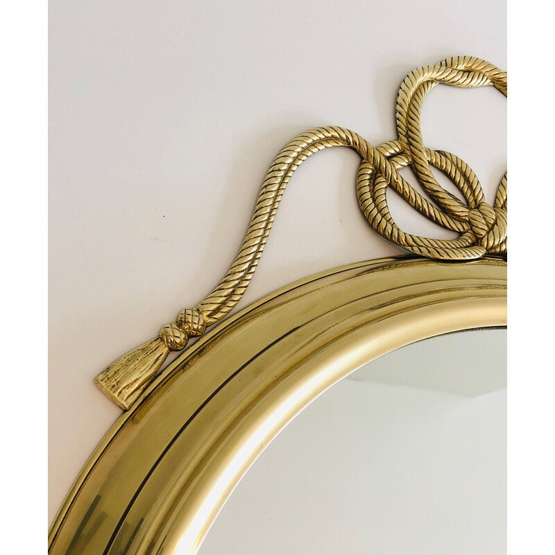 Vintage decorative oval brass mirror with twisted bow, France 1970