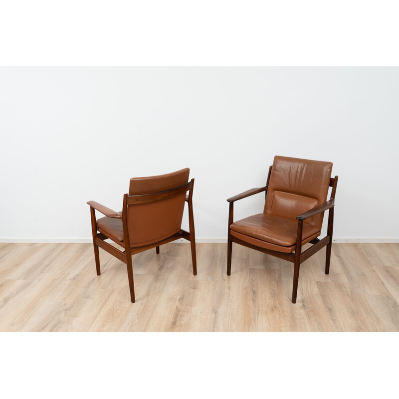 Paar vintage fauteuils model 431 in leer en hout van Arne Vodder voor Pander