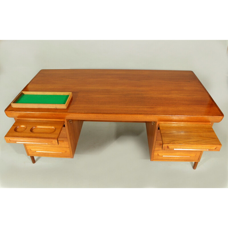 Danish vintage teak desk by Ib Kofod-Larsen for Faarup, 1960s